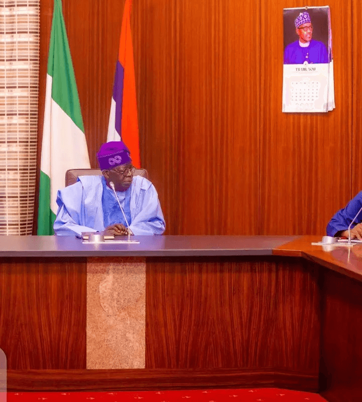 Reactions Trail Buhari's Calendar Being Hanged On The Wall Of Tinubu's Office At The Villa
