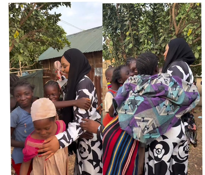 Regina Daniels Melts Hearts as She Bonds with Fans During Village Visit [PHOTOS]